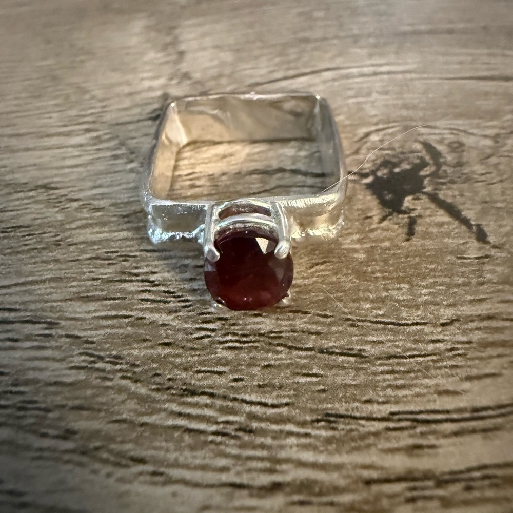 Elegant Silver Ring with Red Gemstone